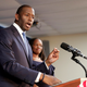 Florida Democratic gubernatorial candidate Andrew Gillum, left, speaks to supporters as his wife R. Jai Gillum listens during a Democratic Party rally Friday, Aug. 31, 2018, in Orlando, Fla.